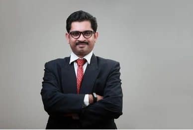 happy-indian-business-man-folded happy-indian-business-man-folded