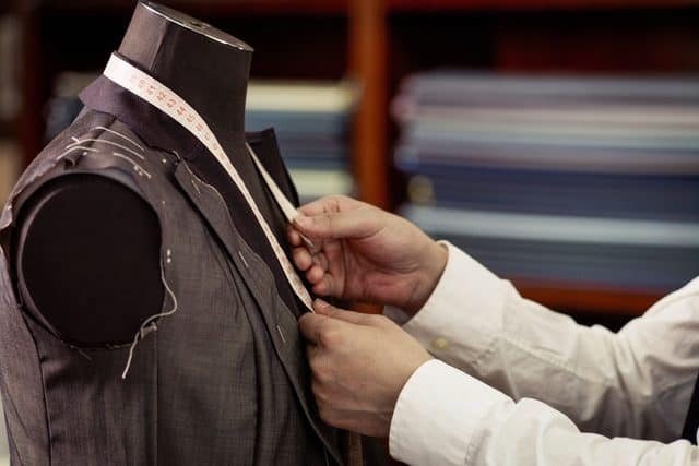 tailor-measuring-men